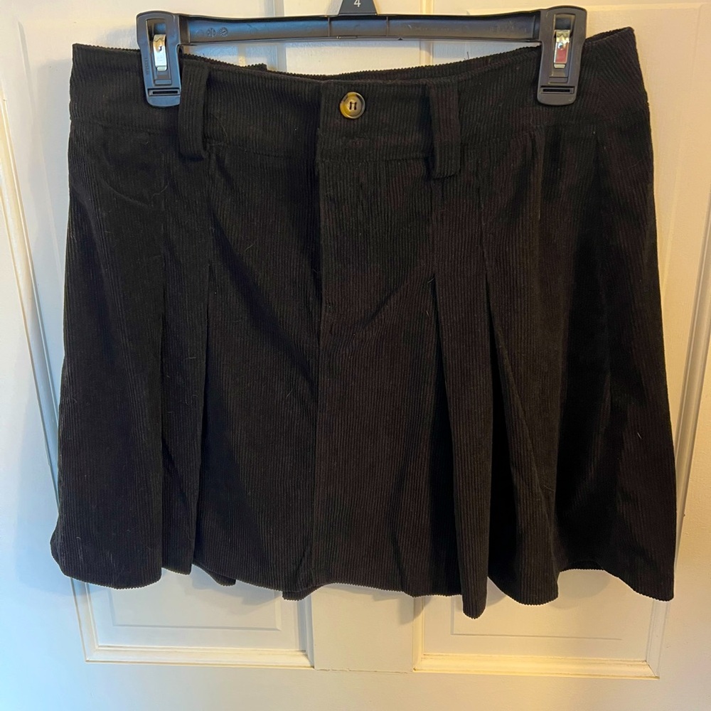 Corduroy black skirt size medium. Worn once with leggings and boots.  Adorable
